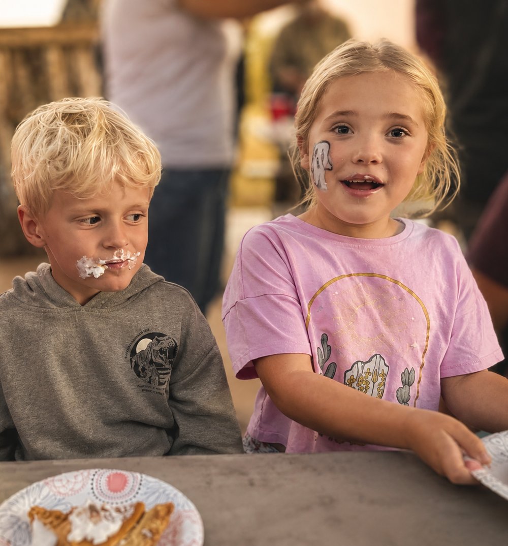 Children enjoying pie at an FCC fellowship event
