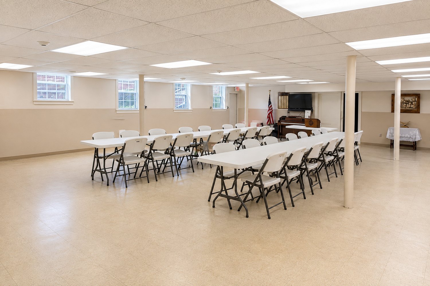 Small Fellowship Hall looking toward the piano and screen